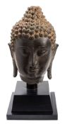 A large Thai bronze Buddha head fragment: of hollow cast construction, probably 17th century,