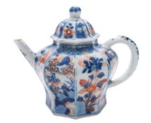 A Chinese Imari teapot and cover: of octagonal baluster form, painted in underglaze blue,