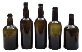 A pair of Powell & Ricketts bottles and three similar: all of three piece cylinder construction,