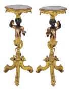 A pair of late 19th/early 20th Century Venetian carved wood and decorated Blackamoor stands,