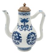 A Chinese blue and white wine ewer: of baluster form with ogee loop handle and long curved spout,