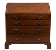 A George III mahogany bureau:,