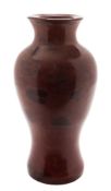 A Chinese 'Imitation Realgar' glass vase: of ovoid form with everted rim,