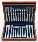 A set of twelve Edwardian silver plated fish knives and forks: initialled,