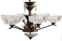 A French Art Deco period copper and brass icicle glass five-light ceiling light fitting by Ezan: