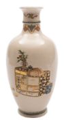 A Japanese Satsuma pottery vase: of ovoid form with ribbed waisted neck and flared rim,