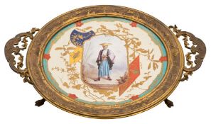 A French 'Japonesque' ormolu-mounted pottery tripod dish: painted with a central panel depicting a