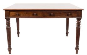 A late Regency mahogany double sided library table:, the rectangular top with moulded edge,