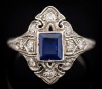 An early 20th century sapphire and diamond cluster ring: the central,