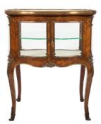 A 19th Century French rosewood and gilt metal mounted bijouterie table display cabinet:,