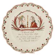 A Dutch-decorated Leeds creamware plate: of silver shape, painted in green, red,