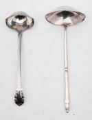 A Georg Jensen silver sauce ladle, maker C F Heisse,