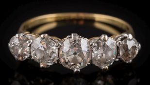 A graduated diamond five-stone ring: with round old-cut diamonds estimated to weigh a total of 2.