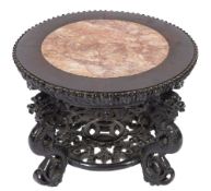A Chinese carved wood low circular urn stand:,