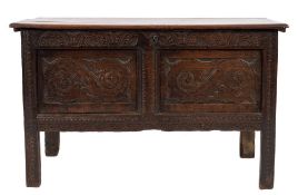An 18th Century oak rectangular coffer:, with a plain hinged top,
