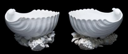 A pair of early Bow white shell salts or sweetmeat dishes: of large size,