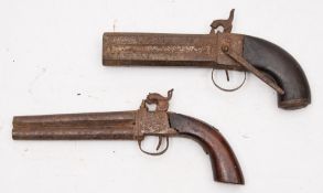 Two over and under percussion cap pistols:,