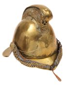 A WWI group of four and a Brass Merryweather LCC Firemans helmet to 'L-7324 Pte J J Barry 12th