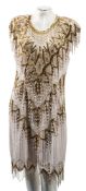 Two late 20th century beaded dresses in the 1930's style:.