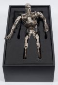 Two Hot Toys 1/4th scale Terminator Endoskeleton figures and an Enterbay Terminator T2 collectors