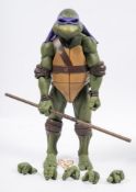 A Neca 1/4th scale Teenage Mutant Ninja Turtle 'Donatello' figure in box:,