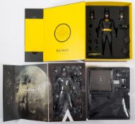 A Hot Toys 1/6th scale figure 'Batman' DX09:, together with a 'Batman Arkham City' figure,