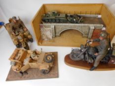 A 1/16th scale Kettenkrad: a 1/16th scale model of a BMW motorcycle and rider,