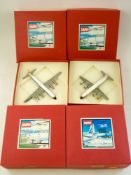 Three WM Classic Airliners and a WM Classic Bombers & Utilities diecast scale model aircraft:,