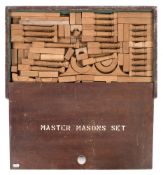 A boxed set of 'Master Masons' wooden architectural building blocks and a collection of 130 wooden