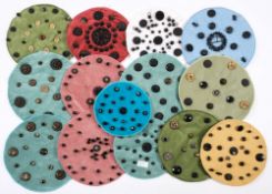 A collection of black glass composition jet and crochet buttons:,