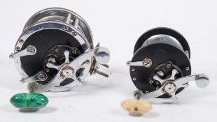 A Penn No 49 Super Mariner Reel together with a Penn Delmar No 285 reel:,