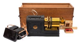 An early 20th century magic lantern:, unsigned in brass with crackle finish,