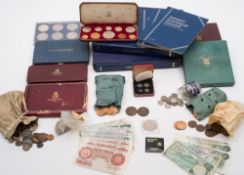 An accumulation of George V and later coins in albums and loose:,