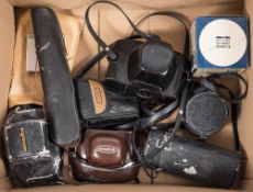 A Minolta 35mm camera:, a Voitgllander camera, a Canon camera, a Canon FX 35mm camera,