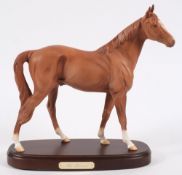 A Royal Doulton model of a racehorse 'The Minstrel':, on a wooden plinth, 35cm high.