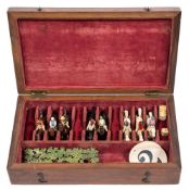 An early 20th century mahogany cased diecast Grand National game:, (probably Chad Valley),