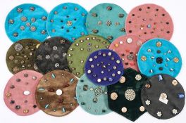A collection of various buttons: including shell hand painted examples mounted on fifteen dralon