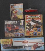 A remote control 18 wheel truck and trailer: boxed, two Contructo kits, boxed,
