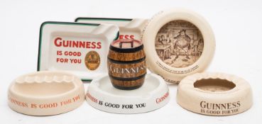 A Minton Guinness barrel ashtray and match holder,