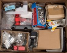 A collection of various diecast and tinplate vehicle chassis and spare parts:,