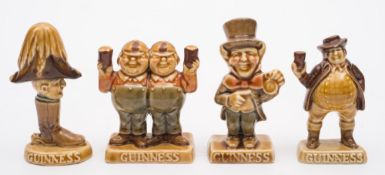 A set of four Wade Guinness advertising figures:, Wellington, Mad Hatter,
