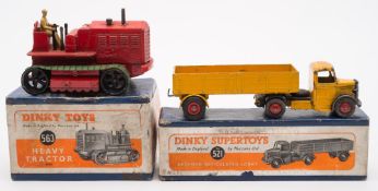 Dinky 521 Bedford Articulated lorry in yellow, together with 563 Heavy Tractor in red:, both boxed,