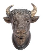 A late 19th/early 20th century cold painted spelter Bull's head vesta:, 8cm high.