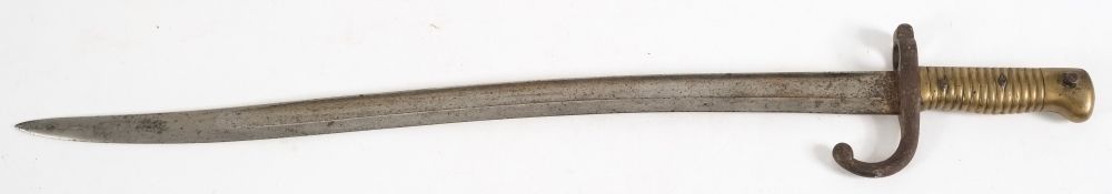 A French St Etienne pattern bayonet:, curved fullered blade dated 1868,