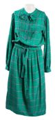 A red cotton wrap around dress by Diane Von Furstenberg:, a floral print dress by Jane & Jane,