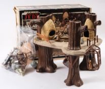A Kenner Star Wars Return of The Jedi Ewok Village Playset:, together with an Ewok glider,