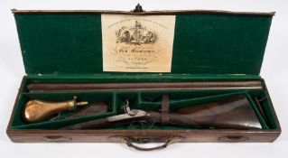 A double barrel percussion cap shotgun by Charles Lancaster, London:,