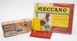 A Meccano Outfit No 4, together with a Meccano Conversion set:,