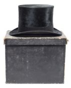 A black silk top hat by Dunn & Co, London:, boxed.