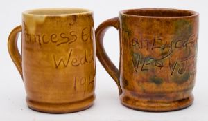 Two Ewenny commemorative pottery mugs: one incised Nantycafan and Brynteg V.E. and V.J.